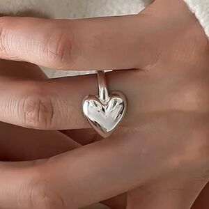 The Overflowing With Love Heart Ring, adjustable in 925 silver